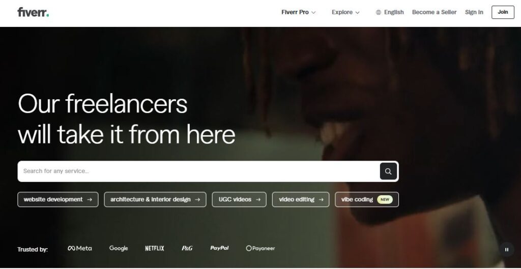 Screenshot of the Fiverr homepage showing the search bar and tagline “Our freelancers will take it from here,” representing Fiverr’s global freelance marketplace.